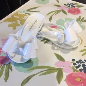 Kate Mack bow flip flops in white